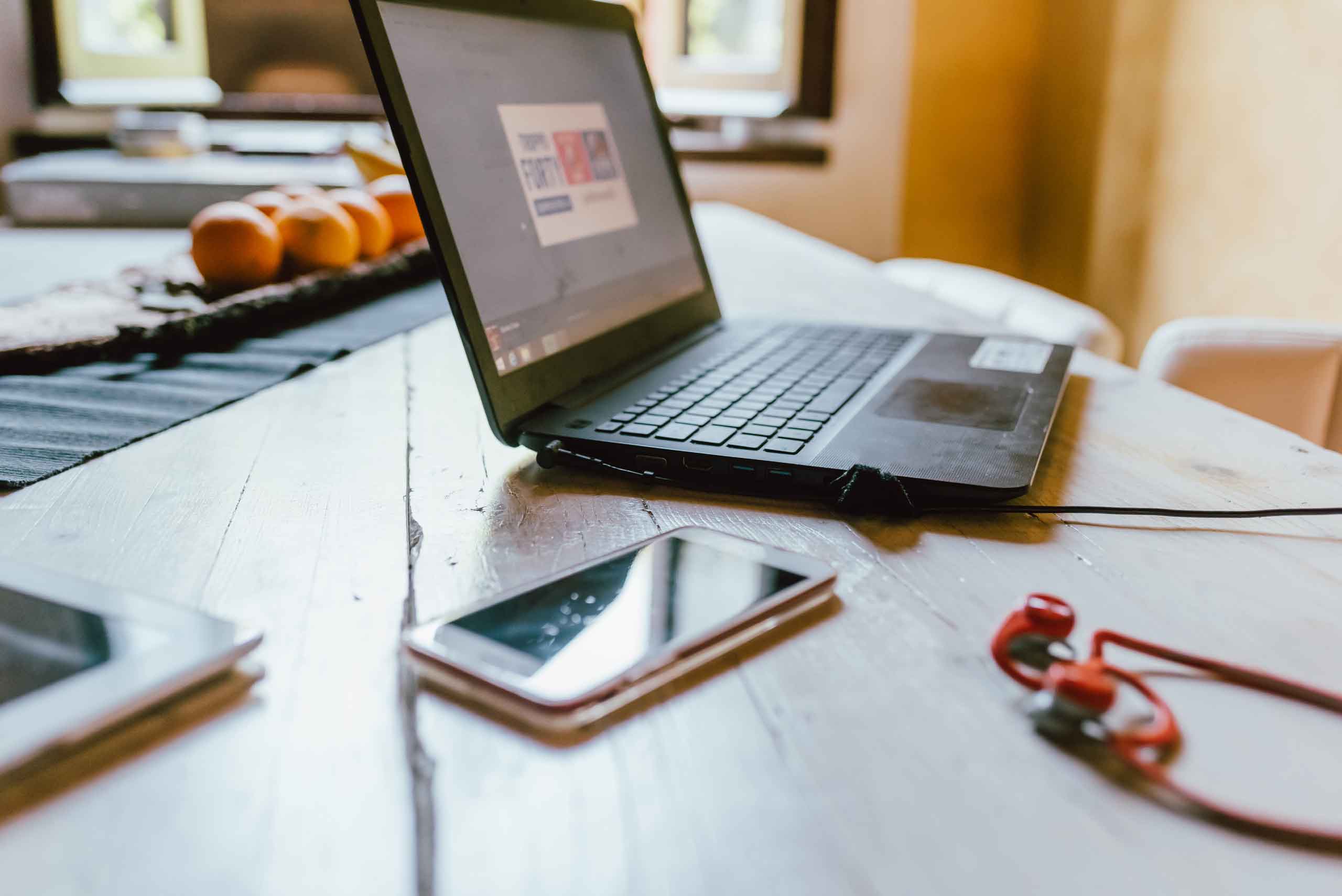 computer-and-smart-phone-on-working-desk-2022-02-11-05-10-43-utc_ONLINE